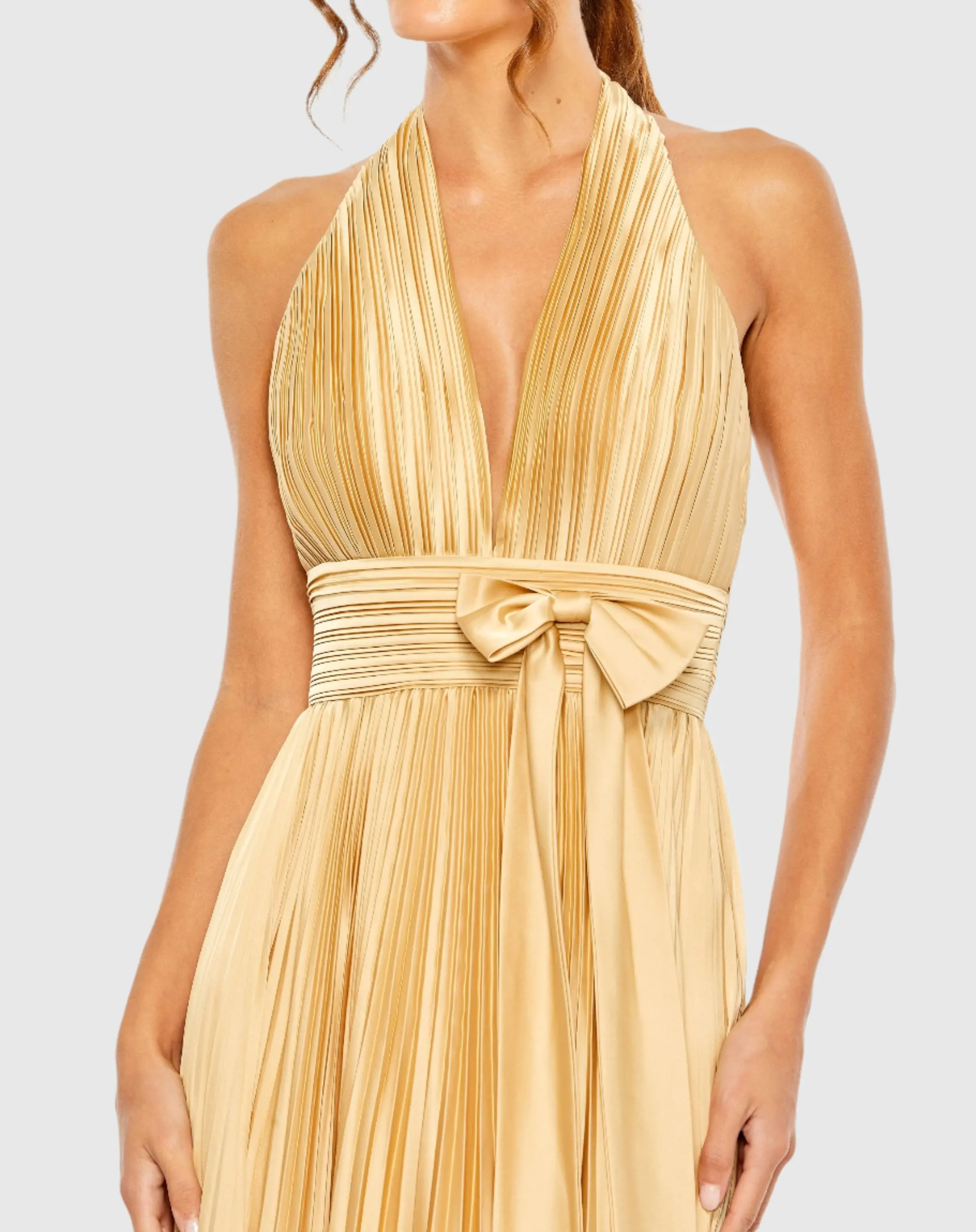 Gold Pleated Halter Neck Gown with Center Bow - Image 2