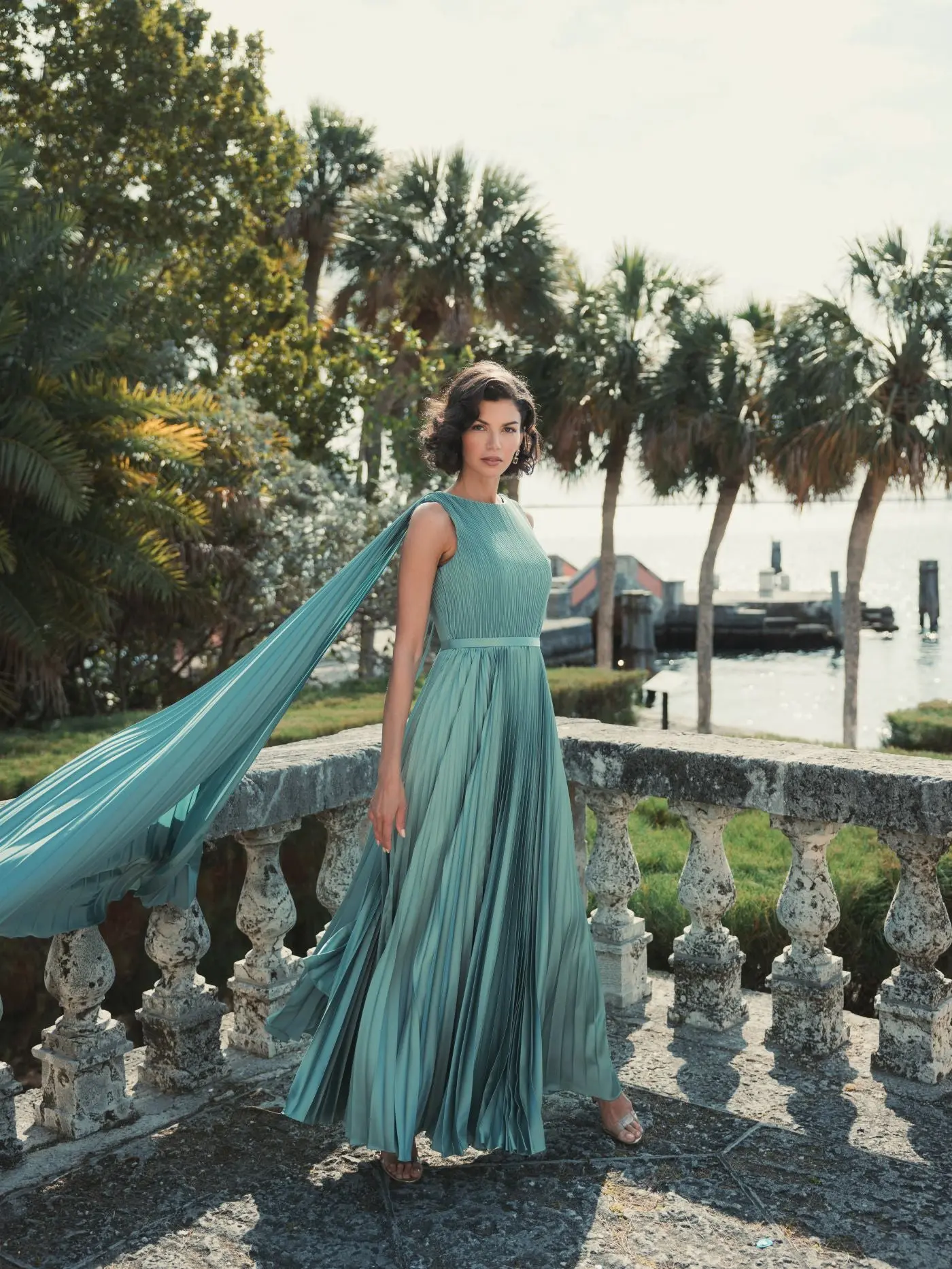Green Sleeveless High Neck Cape Back Heat Pleated Gown - Image 7